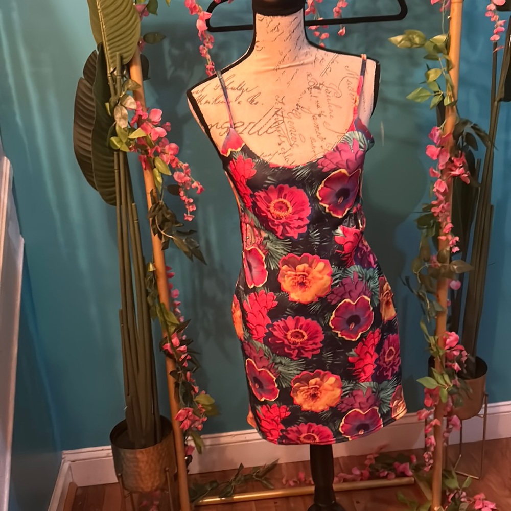 Flower dress with cut outs on the side